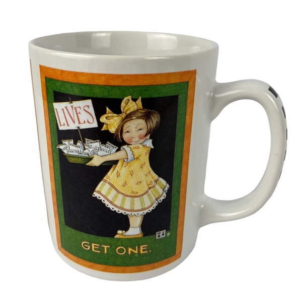 1990s Mary Engelbreit Humorous Coffee Mug "Lives: Get One" Checkerboard Handle - Picture 1 of 7